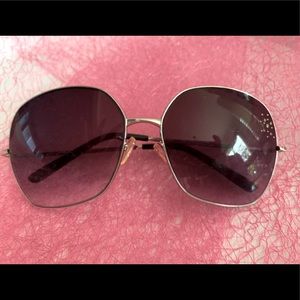 Andrea Jovine woman’s sunglasses in silver with rhinestone detail on lens